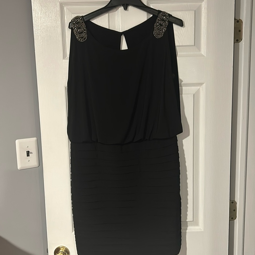 Size 16 blackl dress. Corrections from Dress Barn. Worn a few timesr